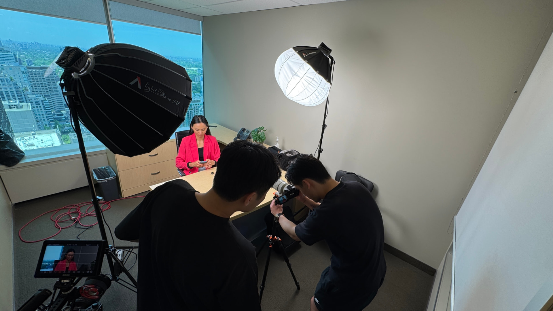 Hyphen Creative crew lighting and filming an office interview in Toronto for "Extension of Life"